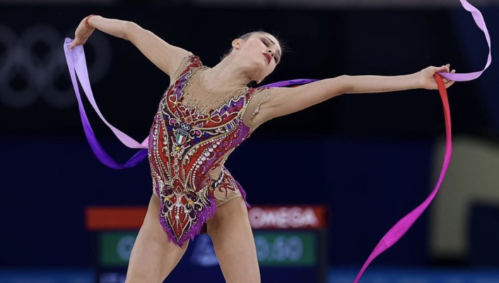 an image of gymnast Milena Baldassarri competing in the tokyo olympics